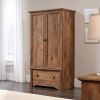A Rustic Oak Drawer and Garment Rod Wardrobe Armoire